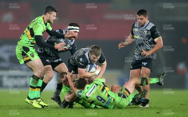 171217 - Ospreys v Northampton Saints - European Rugby Champions Cup - Olly Cracknell of Ospreys is tackled by Nic Groom of Northampton