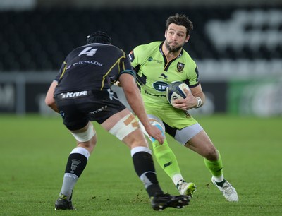 180115 - Ospreys v Northampton Saints - European Rugby Champions Cup -Ben Foden of Northampton takes on Rynier Bernardo of Ospreys