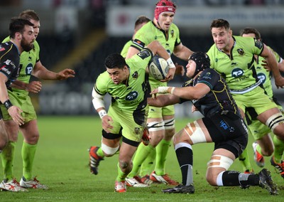 180115 - Ospreys v Northampton Saints - European Rugby Champions Cup -George Pisi of Northampton is tackled by Rynier Bernardo of Ospreys