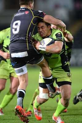 180115 - Ospreys v Northampton Saints - European Rugby Champions Cup -George Pisi of Northampton is tackled by Rhys Webb of Ospreys