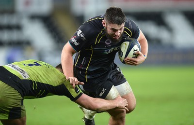 180115 - Ospreys v Northampton Saints - European Rugby Champions Cup -Gareth Thomas of Ospreys is tackled by Calum Clark of Northampton