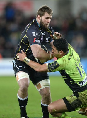 180115 - Ospreys v Northampton Saints - European Rugby Champions Cup -Morgan Allen of Ospreys is tackled by George Pisi of Northampton