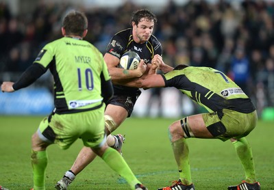 180115 - Ospreys v Northampton Saints - European Rugby Champions Cup -Tyler Ardron of Ospreys takes on Calum Clark of Northampton