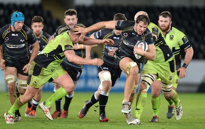 180115 - Ospreys v Northampton Saints - European Rugby Champions Cup -Tyler Ardron of Ospreys gets past Dylan Hartley of Northampton