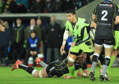 180115 - Ospreys v Northampton Saints - European Rugby Champions Cup -George Pisi of Northampton is tackled by Alun Wyn Jones of Ospreys