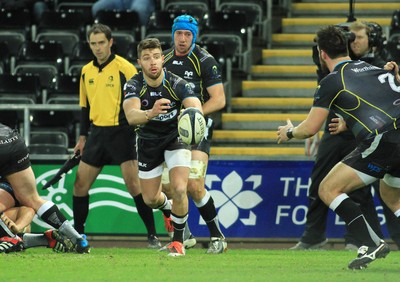 180115 - Ospreys v Northampton Saints - European Rugby Champions Cup -Rhys Webb of Ospreys gets a pass away