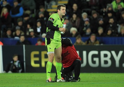 180115 - Ospreys v Northampton Saints - European Rugby Champions Cup -Stephen Myler of Northampton receives treatment