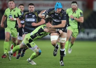 180115 - Ospreys v Northampton Saints, 2014-15 European Rugby Champions Cup - Ospreys Justin Tipuric is tackled by Northampton's Ben Foden