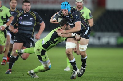 180115 - Ospreys v Northampton Saints, 2014-15 European Rugby Champions Cup - Ospreys Justin Tipuric is tackled by Northampton's Ben Foden