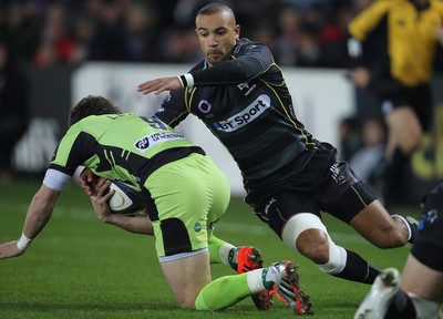 180115 - Ospreys v Northampton Saints, 2014-15 European Rugby Champions Cup - Ospreys Eli Walker tackles Northampton's Lee Dickson