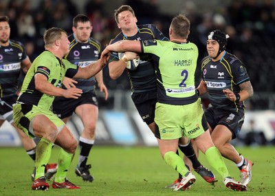 180115 - Ospreys v Northampton Saints, 2014-15 European Rugby Champions Cup - Ospreys Dan Biggar is tackled by Northampton's Dylan Hartley