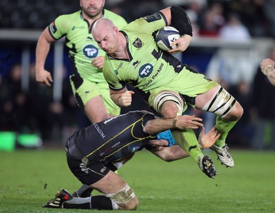 180115 - Ospreys v Northampton Saints, 2014-15 European Rugby Champions Cup - Northampton's Sam Dickinson is tackled by Ospreys Justin Tipuric