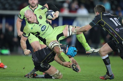 180115 - Ospreys v Northampton Saints, 2014-15 European Rugby Champions Cup - Northampton's Sam Dickinson is tackled by Ospreys Justin Tipuric