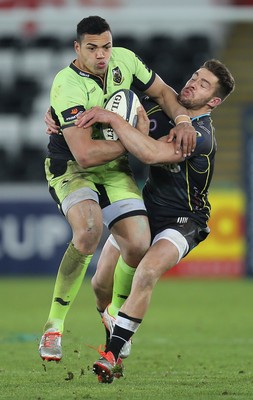 180115 - Ospreys v Northampton Saints, 2014-15 European Rugby Champions Cup - Northampton's Luther Burrell takes on Ospreys Rhys Webb 