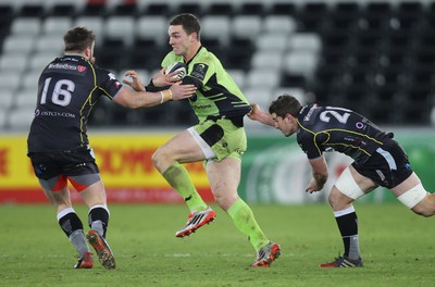 180115 - Ospreys v Northampton Saints, 2014-15 European Rugby Champions Cup - Northampton's George North takes on Ospreys Sam Parry and Ospreys Sam Lewis