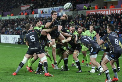 180115 - Ospreys v Northampton Saints, 2014-15 European Rugby Champions Cup - Ospreys Tyler Ardron gets the ball back to Ospreys Rhys Webb 