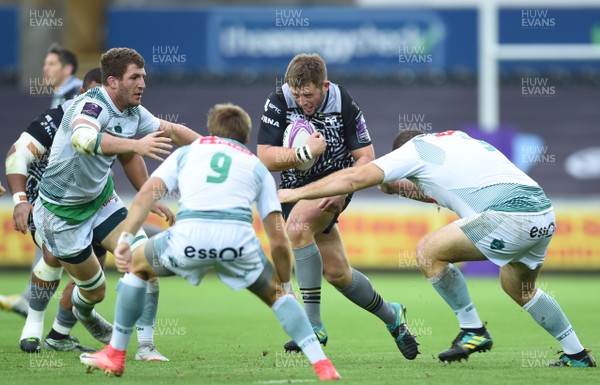 131018 - Ospreys v Pau - European Rugby Challenge Cup - Scott Otten of Ospreys is tackled by Nicolas Corato of Pau