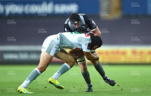 131018 - Ospreys v Pau - European Rugby Challenge Cup - Adam Beard of Ospreys is tackled by Atila Septar of Pau