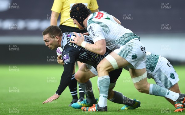 131018 - Ospreys v Pau - European Rugby Challenge Cup - George North of Ospreys is tackled by Laurent Bouchet and Sean Dougall of Pau