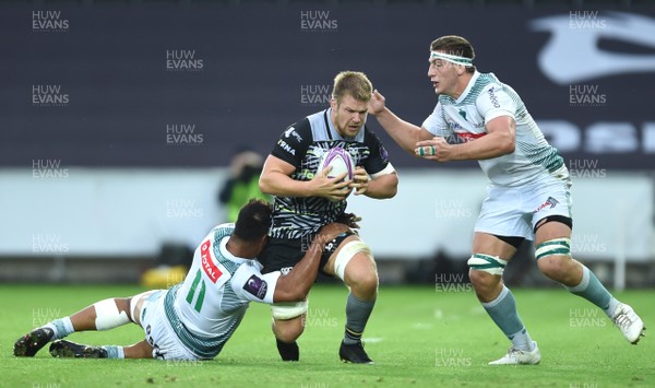 131018 - Ospreys v Pau - European Rugby Challenge Cup - Olly Cracknell of Ospreys is tackled by Frank Halai of Pau