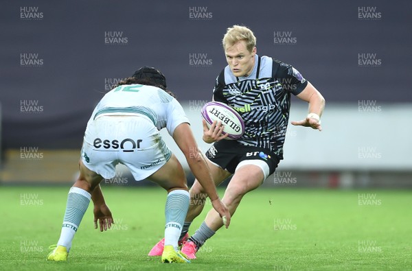 131018 - Ospreys v Pau - European Rugby Challenge Cup - Aled Davies of Ospreys is tackled by Atila Septar of Pau