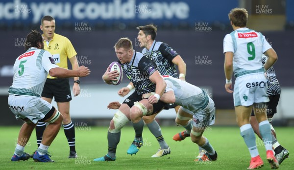 131018 - Ospreys v Pau - European Rugby Challenge Cup - Bradley Davies of Ospreys is tackled by Dan Malafosse and Sean Dougall of Pau
