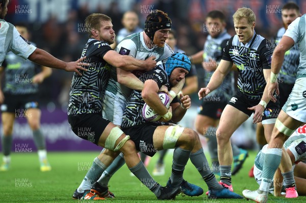 131018 - Ospreys v Pau - European Rugby Challenge Cup - Justin Tipuric of Ospreys is tackled by Sean Dougall of Pau