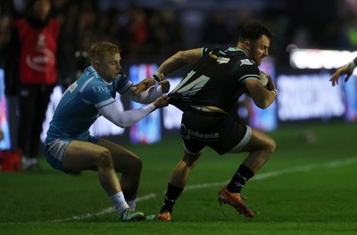 060424 - Ospreys v Sale Sharks - European Rugby Challenge Cup - Luke Morgan of Ospreys is tackled by Tom O�Flaherty of Sale 