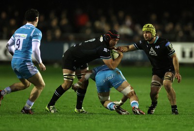 060424 - Ospreys v Sale Sharks - European Rugby Challenge Cup - Morgan Morris of Ospreys is challenged by Sam Dugdale of Sale 