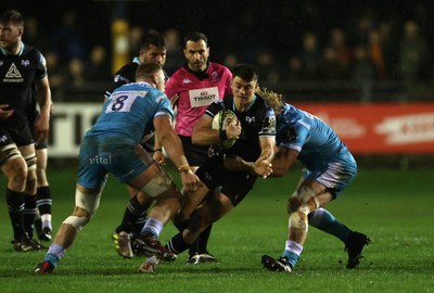 060424 - Ospreys v Sale Sharks - European Rugby Challenge Cup - Reuben Morgan-Williams of Ospreys is tackled by JL du Preez of Sale 