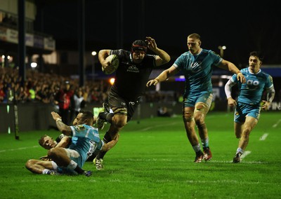 060424 - Ospreys v Sale Sharks - European Rugby Challenge Cup - Morgan Morris of Ospreys dives over the line to score a try