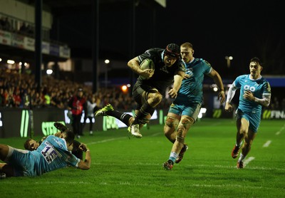 060424 - Ospreys v Sale Sharks - European Rugby Challenge Cup - Morgan Morris of Ospreys dives over the line to score a try