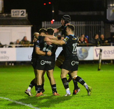 060424 - Ospreys V Sale Sharks - European Rugby Challenge Cup - Reuben Morgan-Williams of Ospreys  celebrates scoring a try with team mates