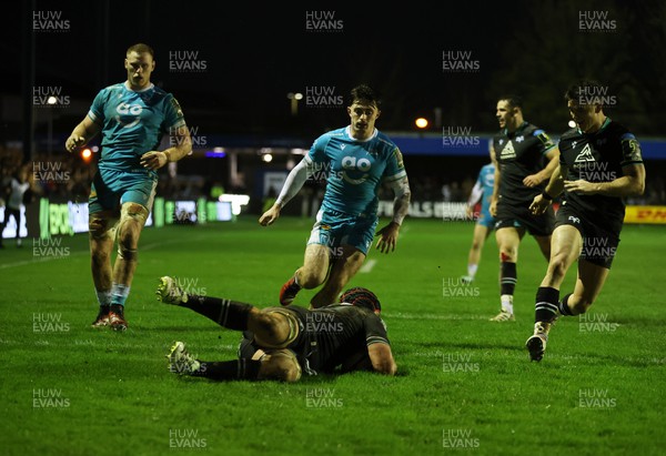 060424 - Ospreys v Sale Sharks - European Rugby Challenge Cup - Morgan Morris of Ospreys dives over the line to score a try