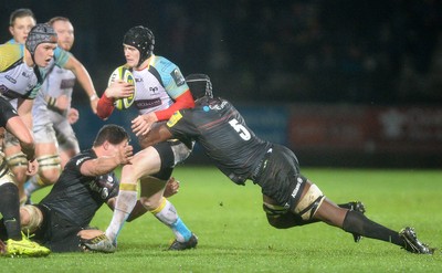 071114 - Ospreys v Saracens - LV= Cup -Dafydd Howells of Ospreys is tackled by Mario Itoje of Saracens