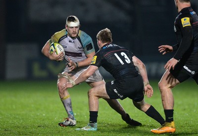 071114 - Ospreys v Saracens - LV= Cup -Lloyd Evans of Ospreys is tackled by Nick Tompkins of Saracens