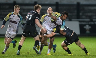 071114 - Ospreys v Saracens - LV= Cup -Hanno Dirksen of Ospreys is tackled by Max Wilkins of Saracens