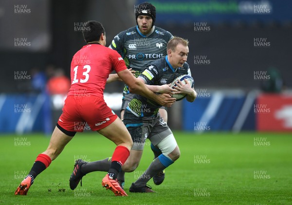 110120 - Ospreys v Saracens - European Rugby Champions Cup - Luke Price of Ospreys is tackled by Alex Lozowski of Saracens