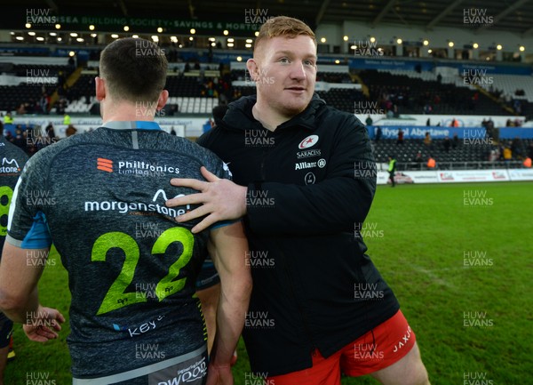 110120 - Ospreys v Saracens - European Rugby Champions Cup - Cai Evans of Ospreys and Rhys Carre of Saracens at the end of the game