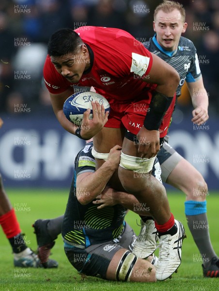 110120 - Ospreys v Saracens - European Rugby Champions Cup - Will Skelton of Saracens is tackled by Sam Cross of Ospreys