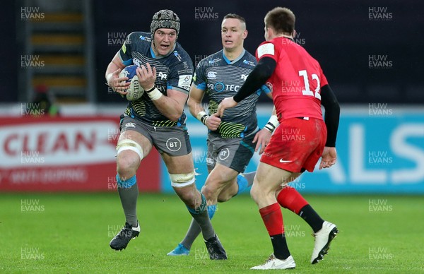 110120 - Ospreys v Saracens - European Rugby Champions Cup - Dan Lydiate of Ospreys is tackled by Nick Tompkins of Saracens