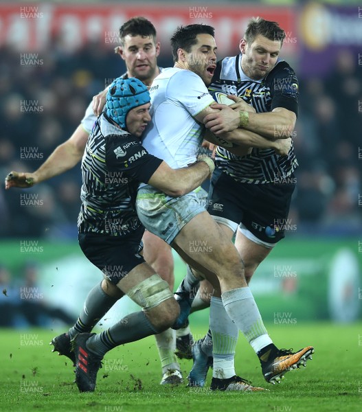 130118 - Ospreys v Saracens - European Rugby Champions Cup - Sean Maitland of Saracens is tackled by Justin Tipuric and Dan Biggar of Ospreys