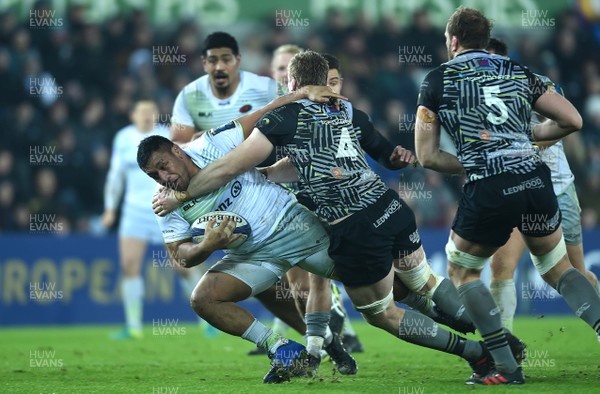 130118 - Ospreys v Saracens - European Rugby Champions Cup - Mako Vunipola of Saracens is tackled by Nicky Smith of Ospreys