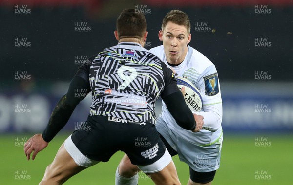 130118 - Ospreys v Saracens - European Rugby Champions Cup - Liam Williams of Saracens is tackled by Rhys Webb of Ospreys