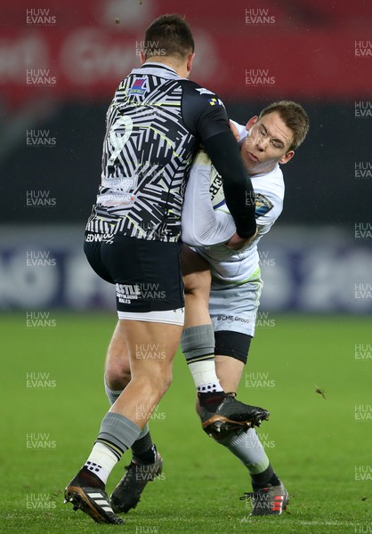 130118 - Ospreys v Saracens - European Rugby Champions Cup - Liam Williams of Saracens is tackled by Rhys Webb of Ospreys