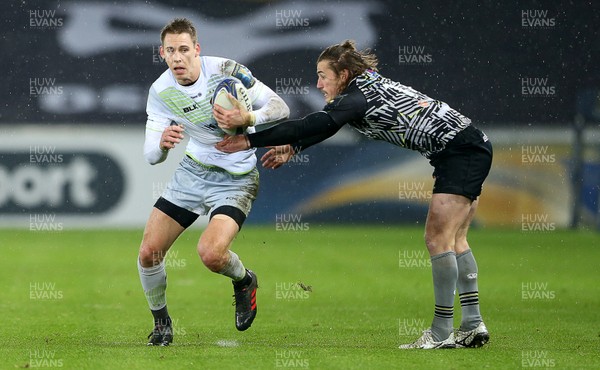 130118 - Ospreys v Saracens - European Rugby Champions Cup - Liam Williams of Saracens is tackled by Jeff Hassler of Ospreys