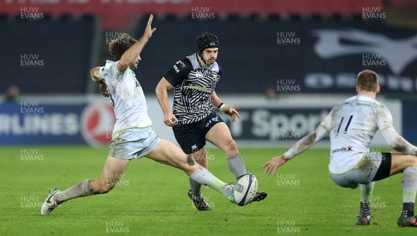 130118 - Ospreys v Saracens - European Rugby Champions Cup - Dan Evans of Ospreys kicks the ball through