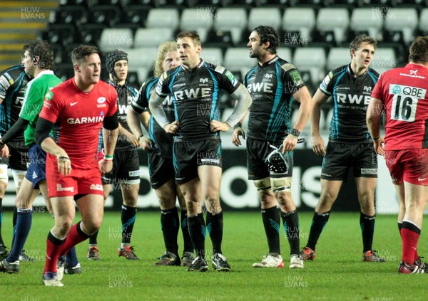 16.12.11 Ospreys v Saracens - Heineken Cup - Ospreys' players are dejected at the final whistle 