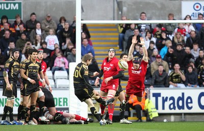 02.04.10 ... Ospreys v Scarlets, Magners League -  Richie Pugh of Scarlets attempts to charge down Dan Biggar's drop goal 