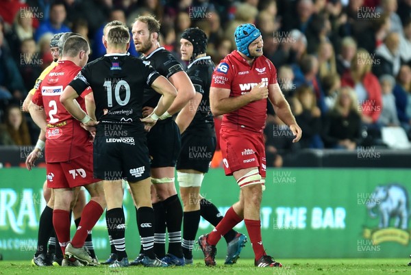 071017 - Ospreys v Scarlets - Guinness PRO14 - Tadhg Beirne (blue cap) of Scarlets leave the field after being shown a yellow card